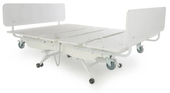White Transfer Master Night Rider HD bariatric bed with adjustable head and foot sections