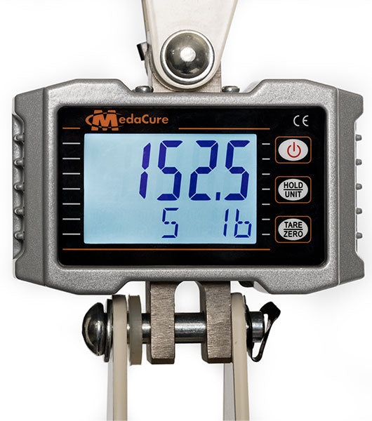 The Free Spirit Bariatric Patient Lift FS660-T digital scale displays 152.5 lb, with 5 and 1b shown below. It has a power base, HOLD UNIT and TARE ZERO buttons on the right, and supports up to 660 lb.