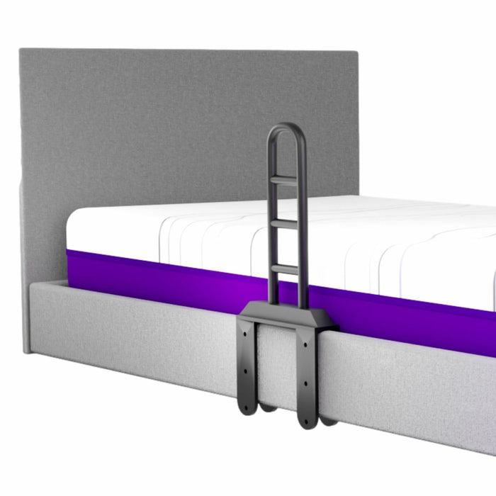 A bed with a purple mattress and ladder, showcasing the Icare Occupational Therapist U-Assist Side Rail for enhanced support