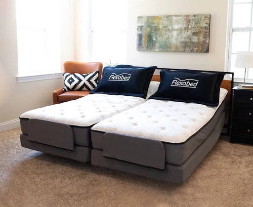 Dual Flexabed Premier adjustable beds in a modern bedroom setup, each with matching pillows and plush mattresses