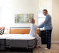 Older couple using a Flexabed Premier adjustable bed, showing supportive design for easy transfers and mobility assistance
