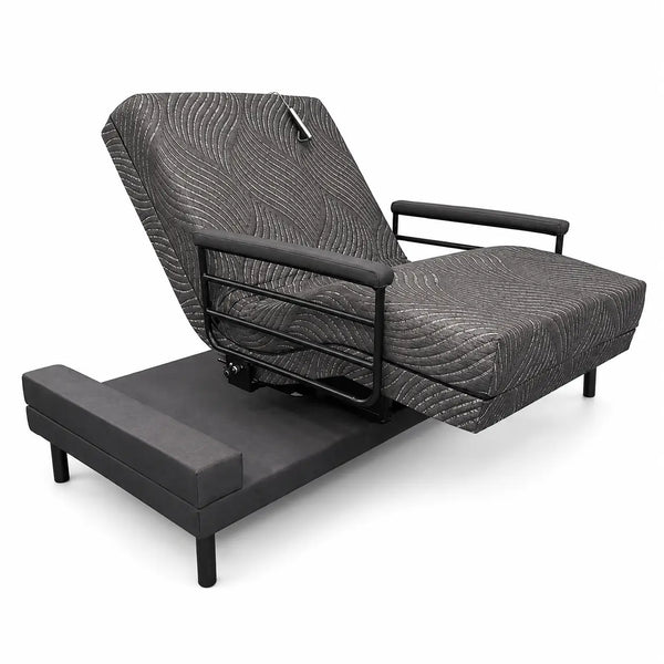 Adjustable rotating bed for seniors with raised backrest, padded mattress, and safety rails for assisted mobility.