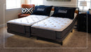 Dual Flexabed Hi-Low adjustable bed with optional mattress and underbed lighting, showing the Flexabed logo on two pillows