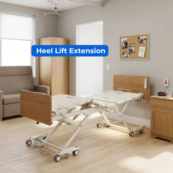Emerald Infinity 54000 bariatric bed with heel lift extension feature shown in assisted living facility room with under bed lighting