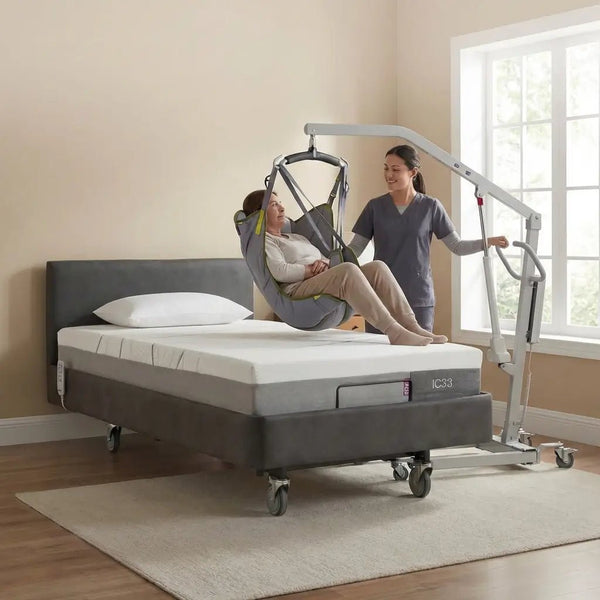 Patient being safely transferred with the Hoyer Lift system, using the iCare IC33 bed. The caregiver adjusts the bed's height for easy and safe patient transfer with the help of the lifting device.