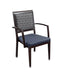 Dining chair with arms for assisted furniture - aluminum wood grain frame with patterned square backrest and blue upholstered seat, shown from a three-quarter rear angle view against white background