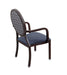 Dining chair for assisted living furniture DCA250-B with wood grain aluminum frame, blue vinyl seat, patterned round back panel, and nickel plated glides - rear angled view