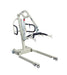 The Free Spirit True Bariatric Patient Lift FS850 is a beige heavy-duty lift with four wheels, arm supports, and a sling attachment, designed to assist in lifting and transferring individuals with mobility challenges.