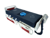 A high-resolution photo of the ObboMed OB-1620 medical air mattress system against a transparent background. The navy blue mattress is shown on a white and red hospital bed frame. It features a central recessed area with a blue bedpan, white foot-placement icons at the base, and a control unit mounted on the footboard with a thick blue air hose connecting to the mattress.