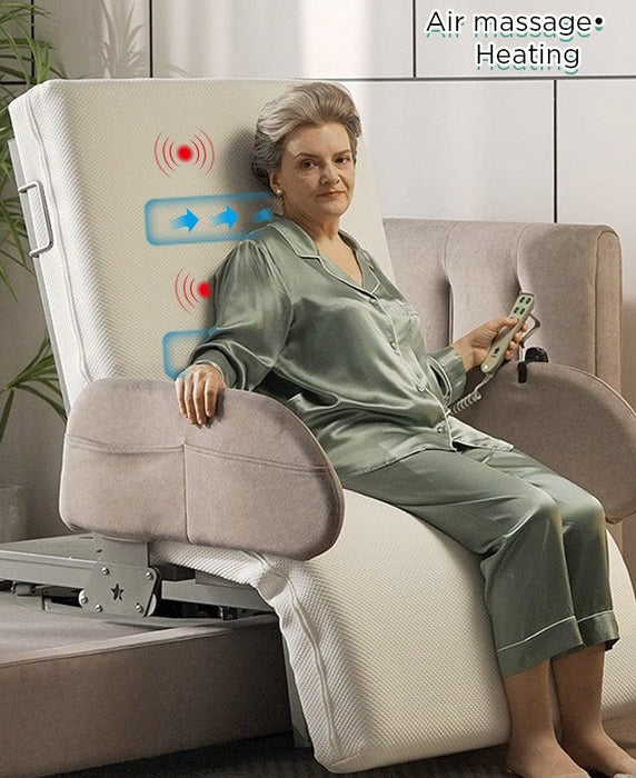 An older woman in silk pajamas relaxes on the Starsleep Orin Rotating Bed with air massage and heating features, holding a remote. The chair’s backrest displays highlighted massage and heat symbols.