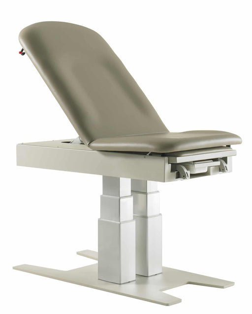 A Graham-Field Hausted 4600 Series powered exam table. This model features a heavy-duty dual-column lift base for adjustable height and an upholstered top with an adjustable backrest.