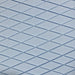 Close-up macro detail of the die-cut surface foam texture of the Protekt 300 pressure redistribution mattress, showing the diamond pattern designed for clinical pressure relief.