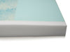 Cross-section view of the Protekt 500 foam core, showing the light blue top layer and the firm, integrated white foam side rail for patient stability.