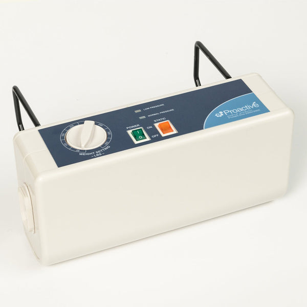 An angled view of the Proactive Protekt Aire 2000/3000 pump with black metal hanging hooks attached. The unit shows its blue control panel with a weight setting dial, power switch, static button, and pressure indicators.