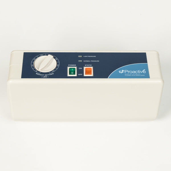 A head-on, slightly elevated view of the Proactive Protekt Aire 2000/3000 pump, showcasing its white casing and blue control panel with a weight setting dial, power switch, static button, and pressure indicator
