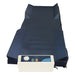 Protekt Aire 3600 system complete setup with foam raised rails and white control unit positioned at the foot of the mattress