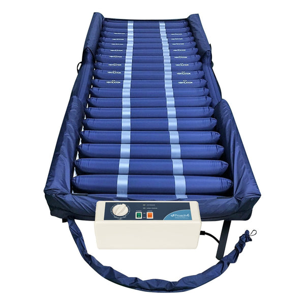 Full view of the Protekt Aire 3600AB alternating pressure air mattress with raised side bolsters, connected to its control pump