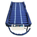 Full view of the Protekt Aire 3500AB alternating pressure air mattress with raised side bolsters, connected to its control pump