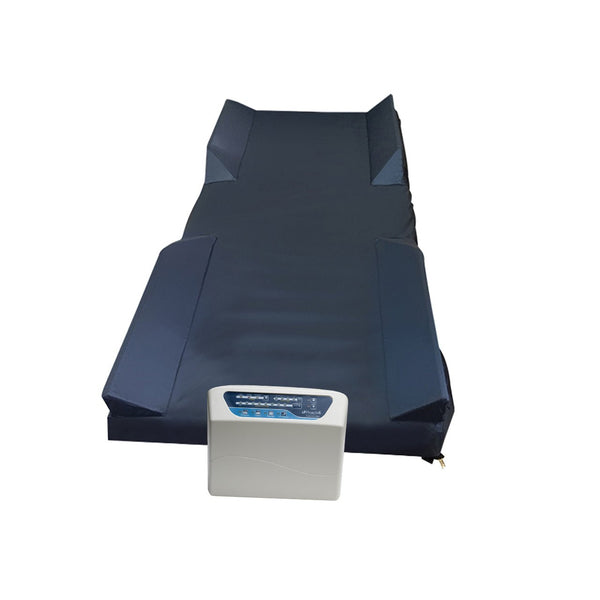 Protekt Aire 6000 system showing the alternating pressure mattress with foam raised rails and connected control unit for hospital bed use