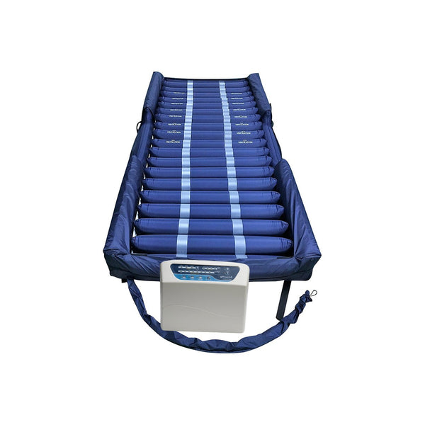 Full-length Protekt Aire 6000AB alternating pressure air mattress with raised side air bolsters, shown with its digital pump at the foot of the bed