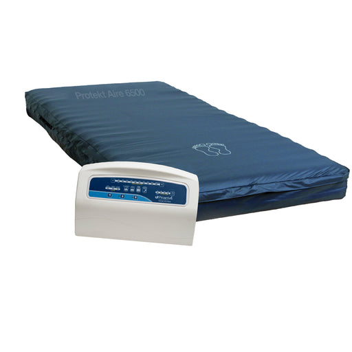 Protekt Aire 6500 system showing the alternating pressure mattress with visible product branding and pump for hospital bed use