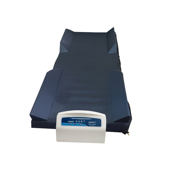 Protekt Aire 6500 system setup showing dark blue alternating pressure mattress with foam raised rails connected to white pump