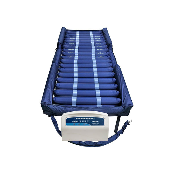 Full Protekt Aire 8600AB bariatric air mattress system with raised side air bolsters, shown with pump connected at foot of bed