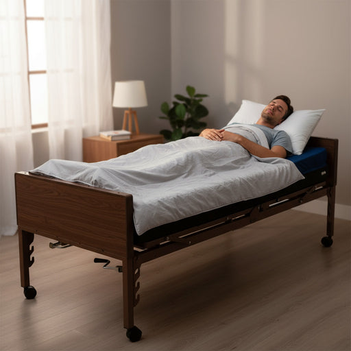 Man resting on the Protekt Supreme Support extra tall self-adjusting mattress system for enhanced comfort and pressure relief on a hospital bed