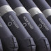 Close-up of dark cylindrical ventilation ducts labeled VENTILATION, resembling airflow channels used in the Protekt Aire 3500 Low Air Loss Air Mattress for Hospice Beds to help prevent pressure ulcers.