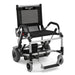 A high-resolution studio shot of the Journey Zinger power chair in black with a silver frame.