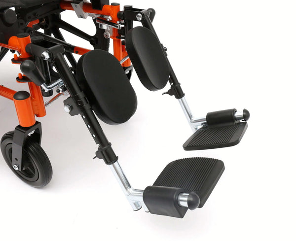 Detail of the elevating leg rests on a Ziggo Pro wheelchair, featuring padded calf supports and adjustable footplates.