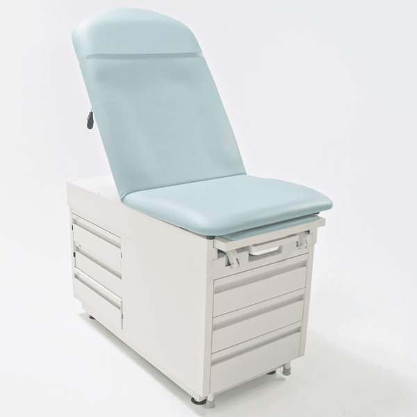 Three-quarter studio view of the Graham-Field Hausted 4200 Series Manual Exam Table in a light teal upholstery. The table features a high-back adjustable backrest, a modular base with integrated storage drawers on the side and front, and a streamlined, medical-grade finish.