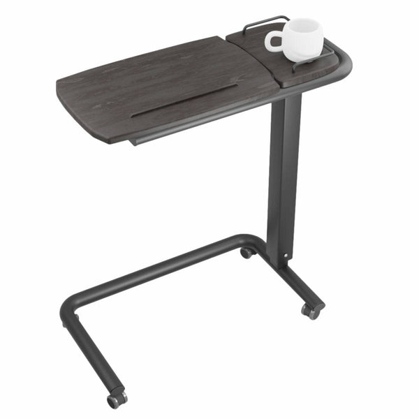 An Icare over bed table for hospital bed with C-shaped base against a plain white background. A white mug is placed on top of the overbed table.