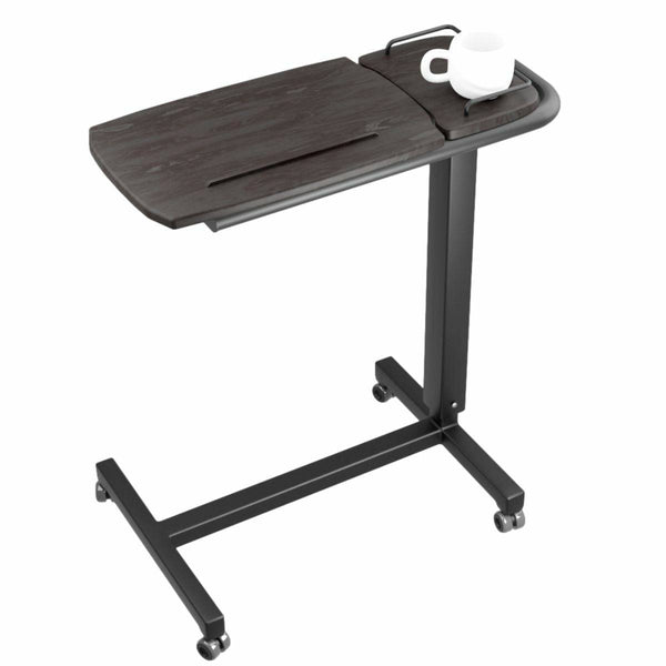 An Icare over bed table with standard profile base against a plain white background. A white mug is placed on top of the overbed table.