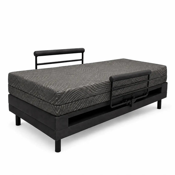 Independence Bed in flat sleeping position with charcoal memory foam mattress, side rails, and elevated base