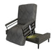 The Independence Bed Adjustable Bed for Seniors by Journey Health & Lifestyle features a black and gray wavy cover, raised backrest, black armrests, remote control on the side, and sits elevated on a platform base for improved fall prevention.