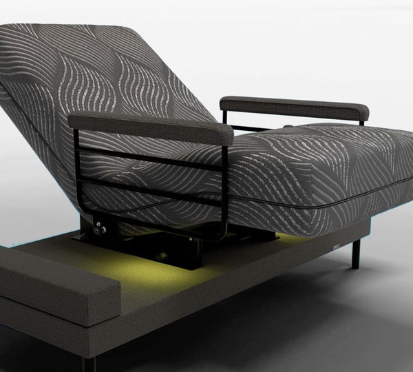 The UPbed Independence Adjustable Bed for Seniors by Journey Health features modern design, under-frame LED lighting for fall prevention, and adjustable comfort, all set against a simple light background.