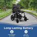 The Journey Air 2026 power wheelchair on a paved park path. Text icons indicate a "Long Lasting Battery" that fully charges in 4 hours and provides up to a 10-mile range.