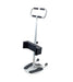 The Assist & Turn Sit to Stand Transfer Aid features a U-shaped handlebar, padded knee support, round base with grip pads, and two small wheels to help users stand and transfer safely.