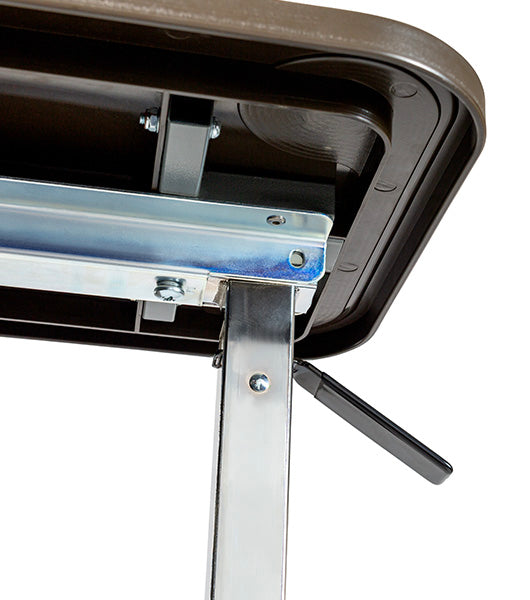Underside view of an overbed table showing the height adjustment mechanism underneath a composite tabletop