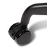 Black swivel caster wheel with locking mechanism for dining table legs, close-up detail view against white background
