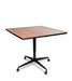 Square tilt top dining table with Biltmore Cherry wood grain surface and black metal base featuring four-wheel casters
