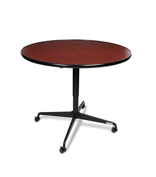 Round tilt top dining table with Mahogany wood grain top and black metal base with four wheel casters