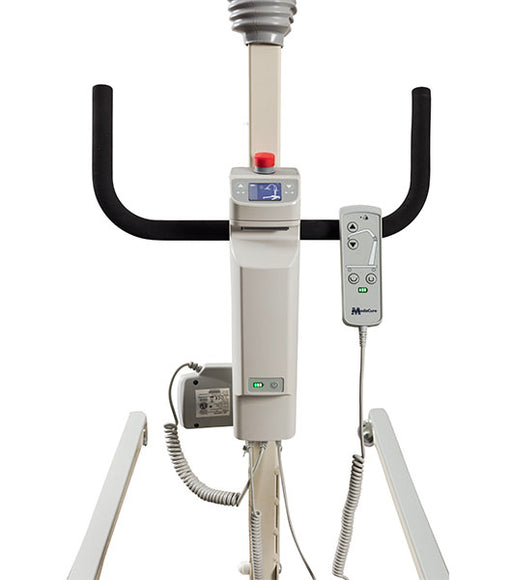 A close-up of the Free Spirit Bariatric Patient Lift FS660-T shows its sturdy power base, black handles, control buttons, digital display, and wired remote, supporting up to 660 lbs.