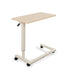 Overbed table for assisted living furniture featuring Maple surface with white height-adjustable base and four-wheel caster system