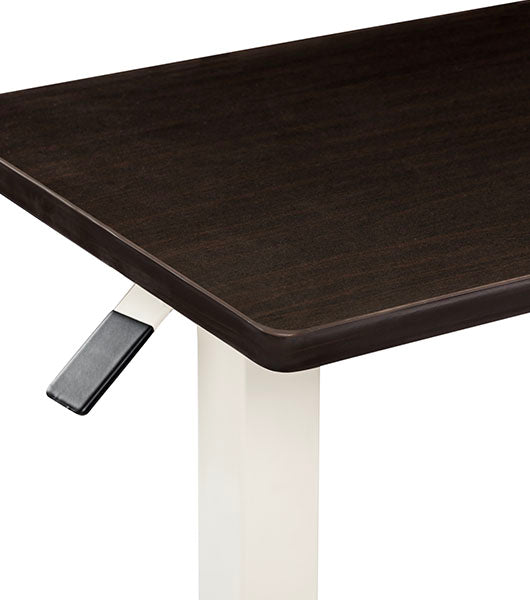 Corner detail of Mahogany tabletop with vinyl trim, white metal table base, and height adjustment lever