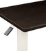 Corner detail of Mahogany tabletop with vinyl trim, white metal table base, and height adjustment lever