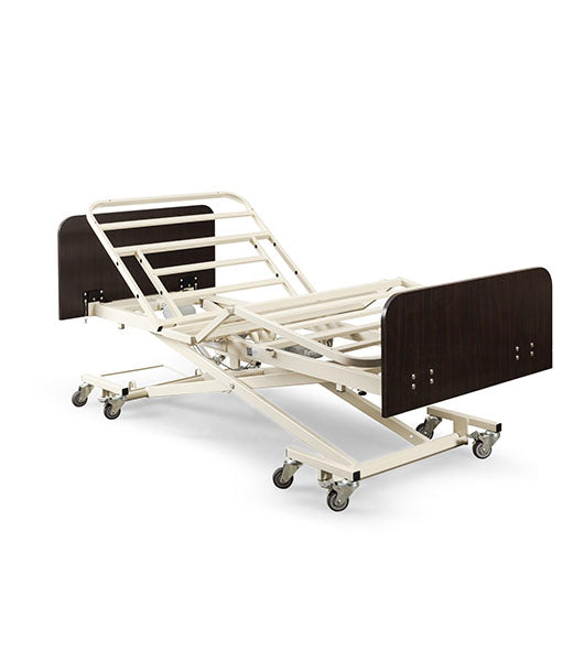 Ultra Low Adjustable Electric Hospital Bed (Medacure ULB7/30) frame shown fully articulated and partially raised, demonstrating the full electric functionality. The bed features mahogany head and footboards and individual caster wheels.