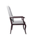 Resident arm chair for assisted living furniture - side profile with light gray fabric upholstery, wooden armrests and frame