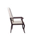 Resident arm chair for assisted living furniture - side profile view showing beige upholstered seat and backrest with wooden armrests and frame